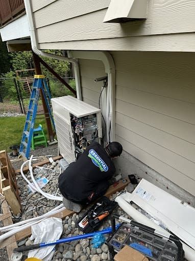 Emergency HVAC Services in Seattle Essential Heating and Air Team at work